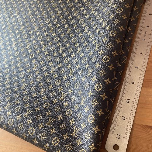 LL24 Black Vinyl fabric with mini gold Patterns