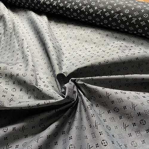 LO09 Black Nylon Liner Fabric with embroidery patterns