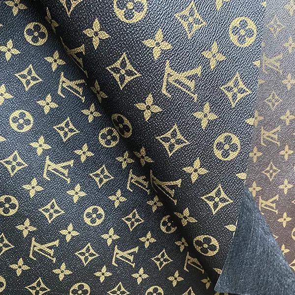 LL08 Black fabric with gold pattern