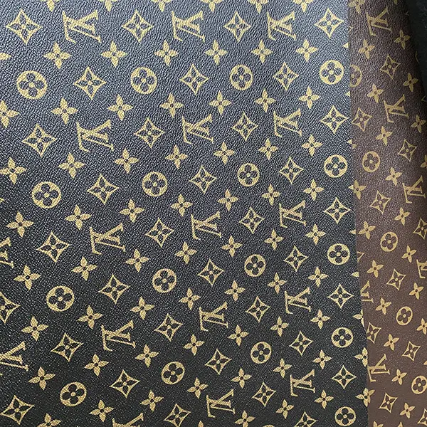 LL08 Black fabric with gold pattern