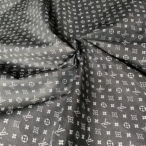 LO09 Black Nylon Liner Fabric with embroidery patterns