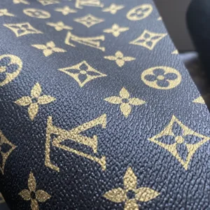 LL08 Black fabric with gold pattern