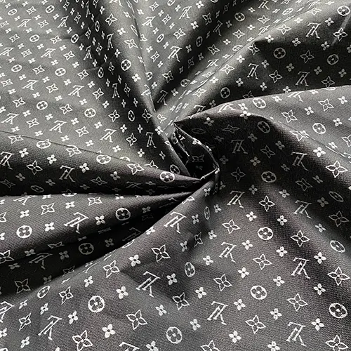 LO09 Black Nylon Liner Fabric with embroidery patterns