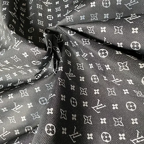 LO09 Black Nylon Liner Fabric with embroidery patterns