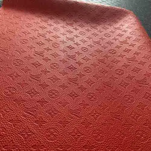 LL22 embossed empreinte red leather fabric