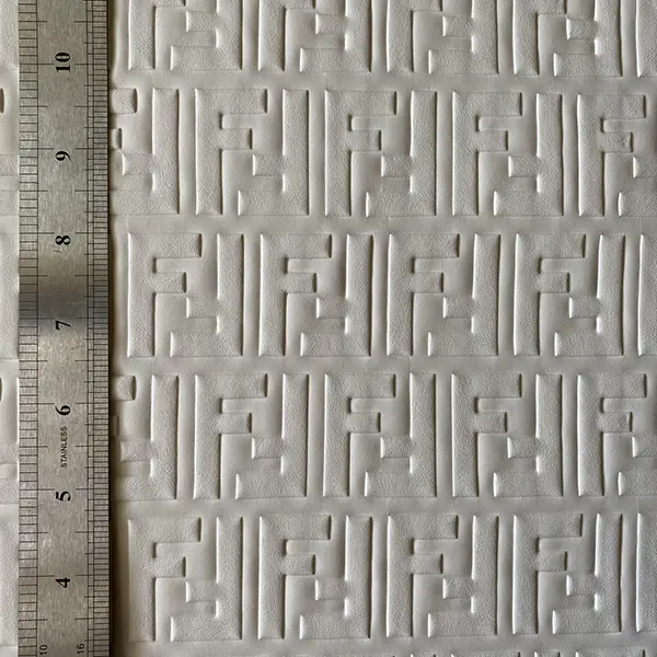 FL02 Embossed White Material by the yard
